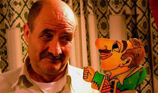 “Οδοιπορώντας με τις σκιές του Καραγκιόζη”